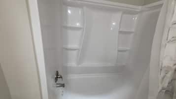 Combined shower/tub, towels, soap, toilet paper