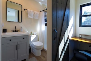 House, Multiple Beds, Patio, Garden View (Creator Cabins) | Bathroom | Shower, towels