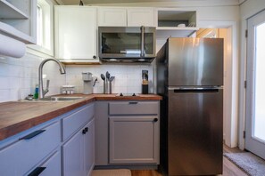 Fridge, microwave, coffee/tea maker, toaster