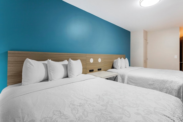 Premium Room, 2 Queen Beds (Upgraded Bedding & Snack, Smoke Free) | Desk, laptop workspace, blackout curtains, iron/ironing board