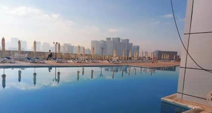 Sea view  2-bedroom apartment with AC, fitness room, swimming in fantastic Ajman