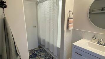 Hair dryer, towels, soap, shampoo