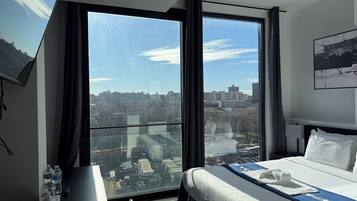 Deluxe Room | Desk, laptop workspace, iron/ironing board, free WiFi