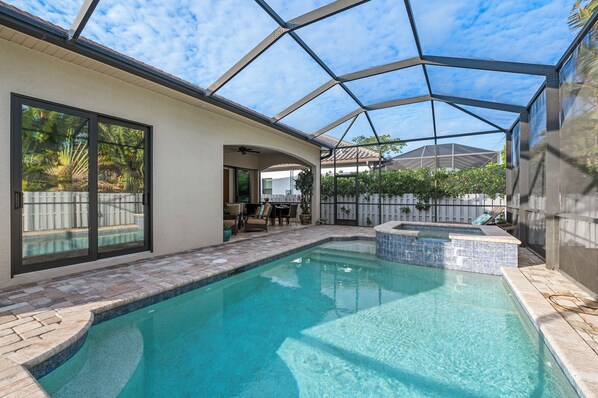 Outdoor pool, a heated pool - Luxe Home 1 mile to Vanderbilt Beach, Pool & Spa, Pet Friendly

 (Naples)