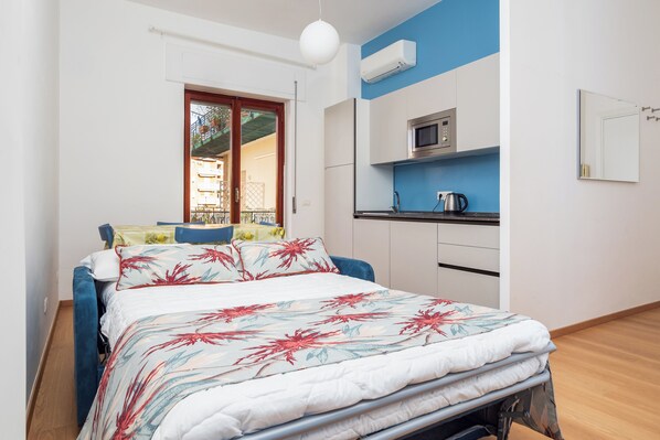 Appartement Ville, balcon, vue sur la ville | Aire de séjour | Téléviseur à écran plat de 40 po avec télévision numérique, Netflix