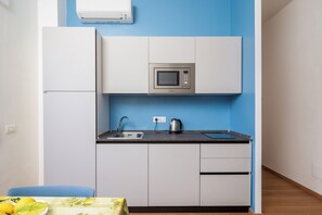 Appartement Ville, balcon, vue sur la ville | Cuisine privée | Cafétière à espresso, bouilloire électrique