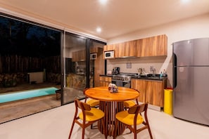 Fridge, cookware/dishes/utensils, dining tables