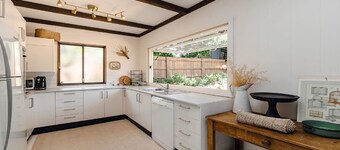 Coastal vintage cottage brimming with character and charm just moments to  beaches, bay and cafes.
