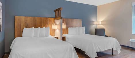 Premium bedding, laptop workspace, iron/ironing board, free WiFi
