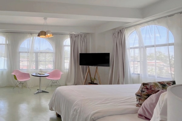 Premium bedding, pillowtop beds, in-room safe, individually decorated