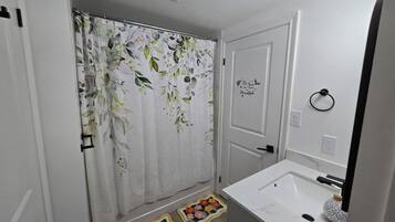 Hair dryer, towels, soap, shampoo