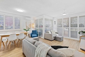 Apartment, 3 Bedrooms, Pool View | Living area | 55-inch Smart TV with cable channels - Wyuna Ocean Views in Burleigh (Burleigh Heads)