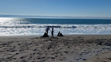 On the beach, sun loungers