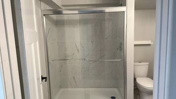 Bidet, towels, soap, toilet paper