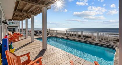 Hailo: Spacious 7-Bedroom Oceanfront Retreat in Oak Island, NC, perfect for up to 18 guests.