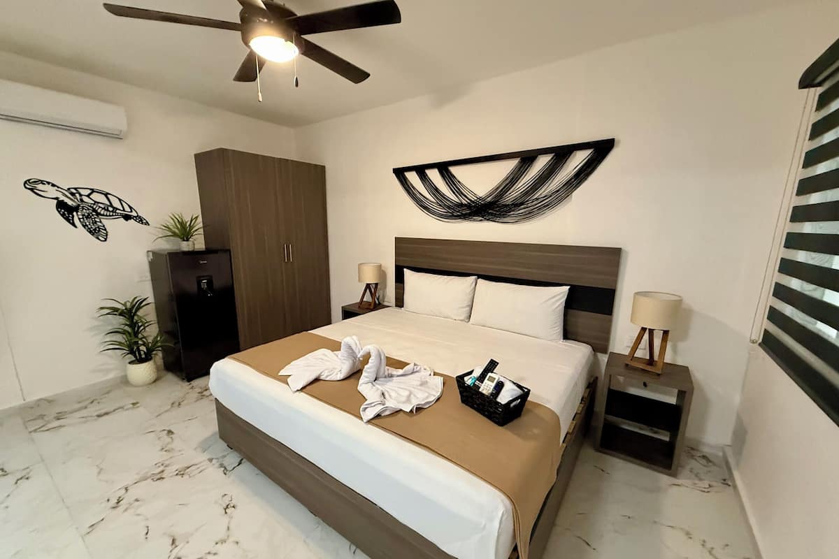 Junior Suite, 1 King Bed with Sofa bed, Garden View | 1 bedroom, free WiFi, bed sheets