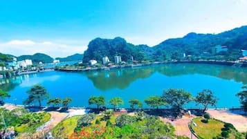 Panoramic Quadruple Room, Lake View | Soundproofing, free WiFi