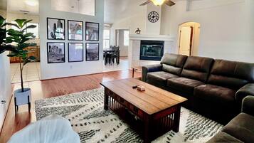 Smart TV, fireplace, books, offices