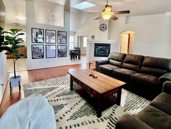 Smart TV, fireplace, books, offices