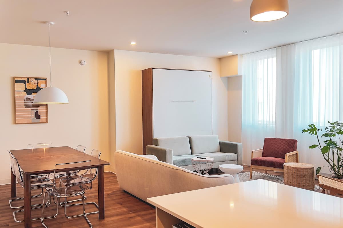 Superior Apartment | Living area | 55-inch flat-screen TV with digital channels, streaming services