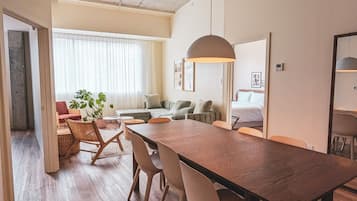 Premium Apartment | Living area | 55-inch flat-screen TV with digital channels, streaming services