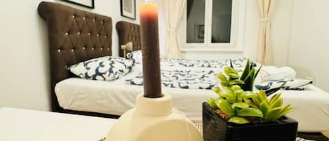 1 bedroom, desk, bed sheets
