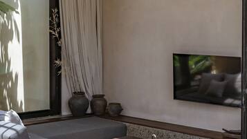 Villa, 2 Bedrooms, Patio, Pool View | Living room | 43-inch TV with cable channels