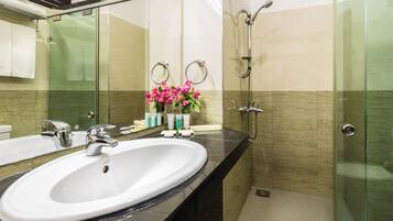 Hair dryer, towels, soap, shampoo