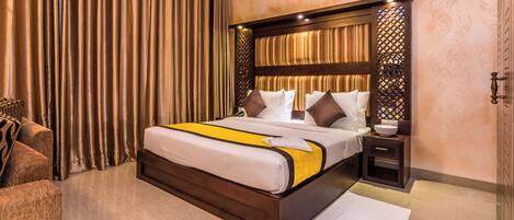 Desk, laptop workspace, blackout drapes, soundproofing