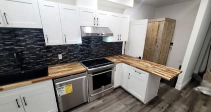 Quiet bright 2 bedroom 1 bathroom suite in town!