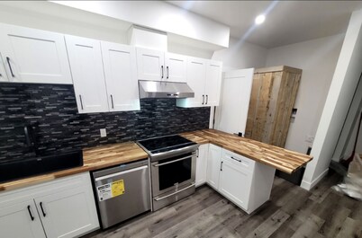 Quiet bright 2 bedroom 1 bathroom suite in town!