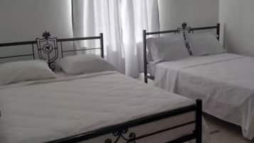 2 dormitorios, tabla de planchar con plancha, wifi y ropa de cama