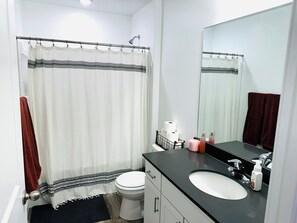 Hair dryer, towels, soap, shampoo