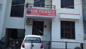 A two-story building with a sign for 'OM TRANCE Homestay'. - Om Trance Homestay (Jaipur)