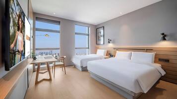 Family Triple Room | Premium bedding, down comforters, memory foam beds, free minibar