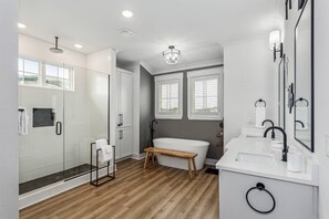 Shower, hair dryer, towels, shampoo