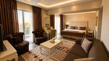 Family Quadruple Room, Balcony, Sea View | Memory-foam beds, in-room safe, desk, laptop workspace