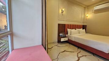 Deluxe Room | In-room safe, laptop workspace, iron/ironing board