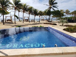 Outdoor pool - Curacion Beach Resort  (Brick Bay)