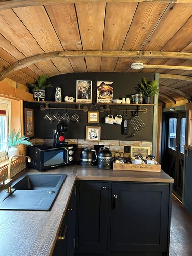 Charming Boutique Train Carriage with large outside seating area and bath