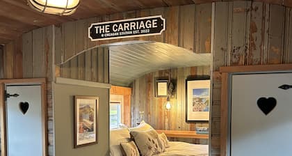 Charming Boutique Train Carriage with large outside seating area and bath