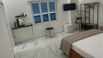 1 chambre, fer et planche Ă repasser, Wi-Fi, draps fournis