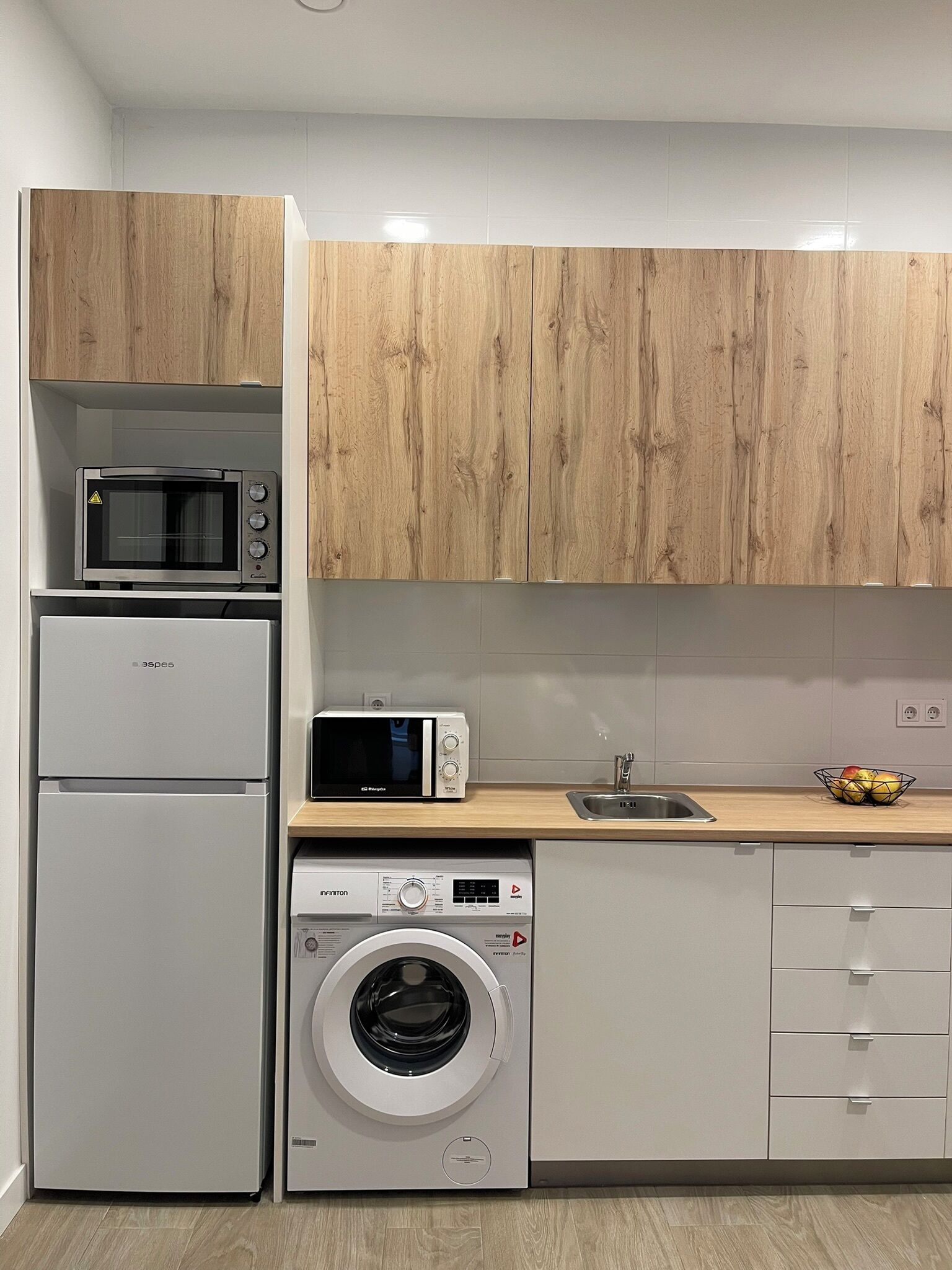 Apartment | Private kitchen | Fridge, microwave, stovetop, cookware/dishes/utensils