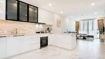Luxury Apartment, City View | Private kitchen | Fridge, microwave, stovetop, cookware/dishes/utensils