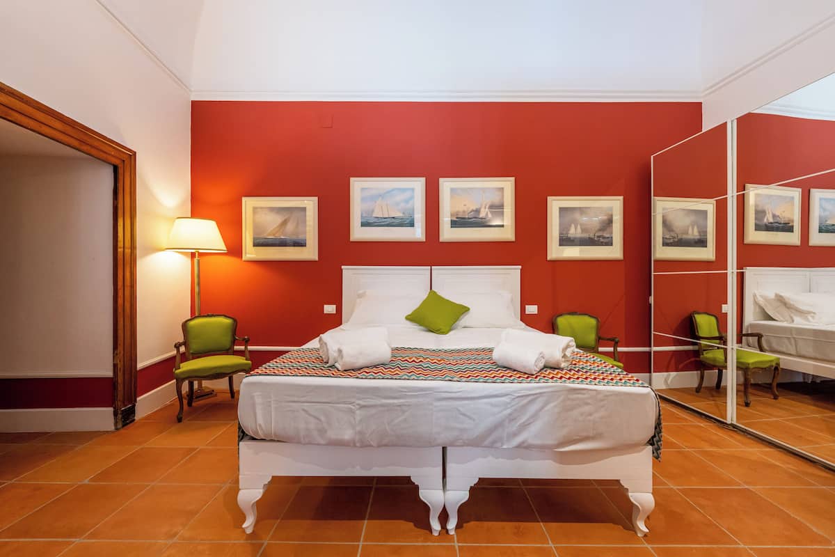 Deluxe Room, Balcony, Courtyard View | In-room safe, soundproofing, free WiFi