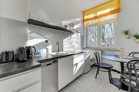 Comfort Apartment | Private kitchen | Fridge, coffee/tea maker, electric kettle, highchair