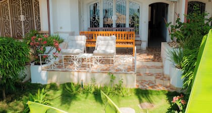A little corner of paradise in saly, senegal, feet in the water