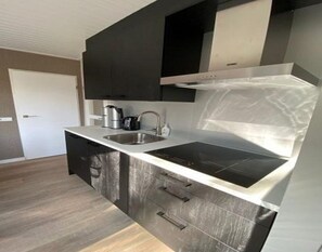 Bungalow | Cuisine privée | Chaise haute