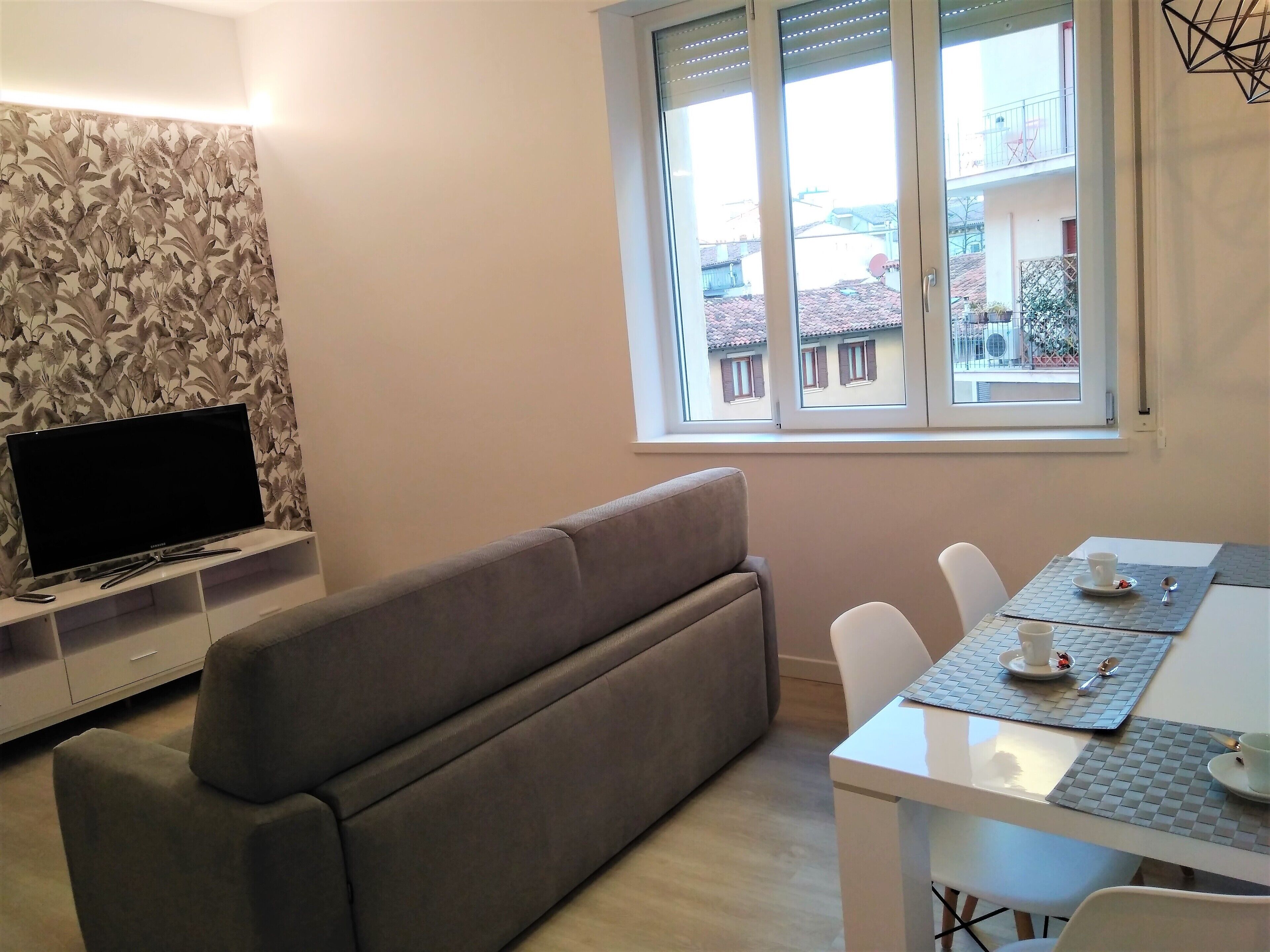 Appartamento, balcone | Area soggiorno | Smart TV 46 pollici con canali via cavo, pavimenti riscaldati