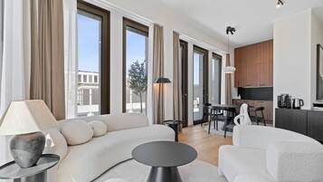 Deluxe Apartment, 1 Bedroom, City View | 1 bedroom, individually decorated, individually furnished, desk